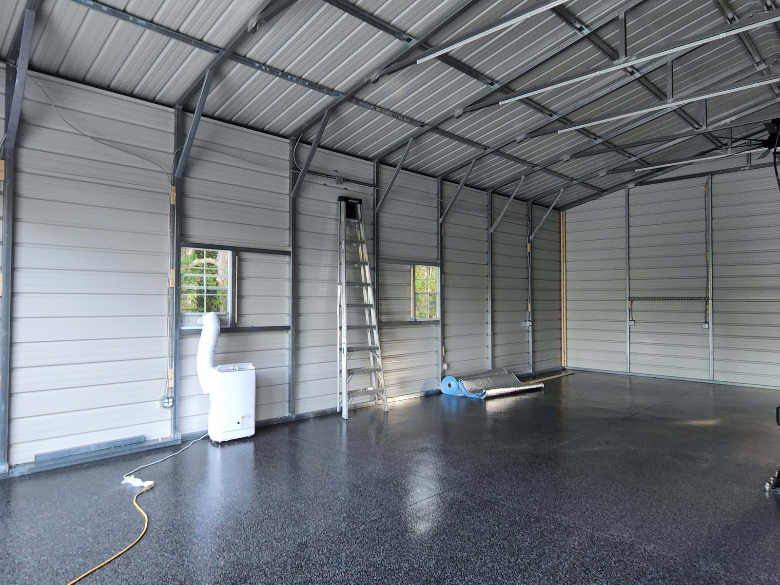 Tubular steel carport interior